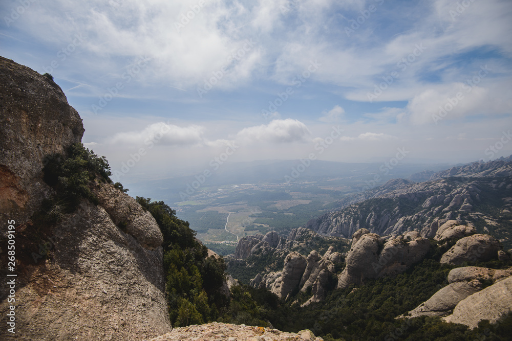 Aerial view of Montserrat mountains in a beautiful summer day, Catalonia, Spain 