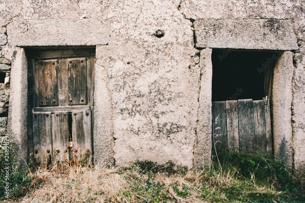 Old Stone House wall with doors