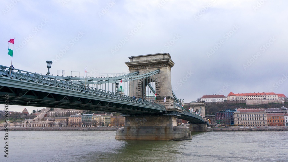 The Széchenyi Chain Bridge (Hungarian Széchenyi lánchíd,) is a suspension bridge that spans the River Danube between Buda and Pest