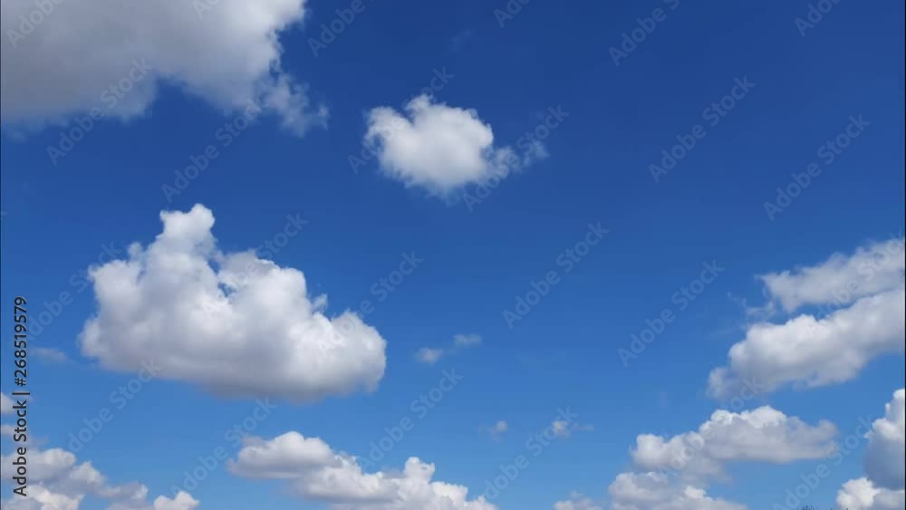 Time lapse clouds, fast rolling puffy clouds are moving, white lightness clouds timelapse. 4k Time lapse clouds, fast rolling puffy clouds are moving, white lightness clouds timelapse. 4k