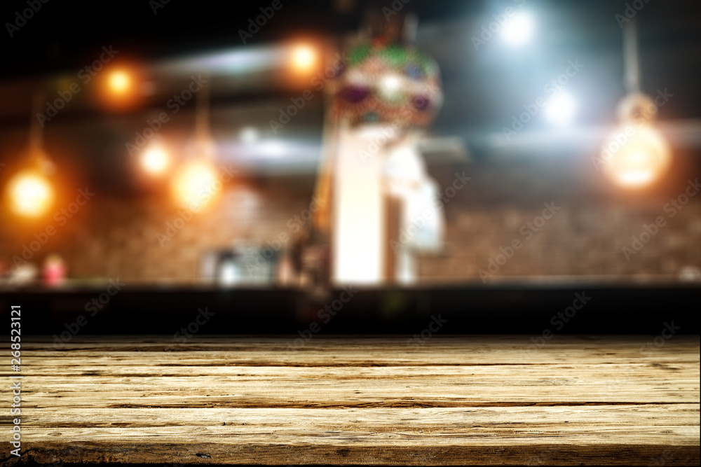 Desk of free space and blurred bar background. Desk of free space and blurred bar background.