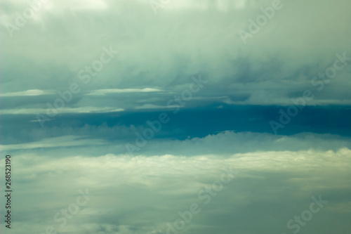 dark clouds and blue sky aerial view