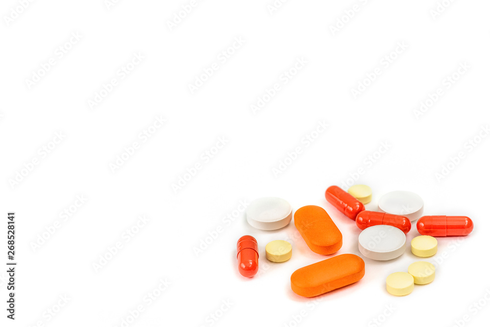 Assorted medical pills, capsule, medication, tablets isolated on white with copy space. Pharmacy lab and pharmaceutical research concept.