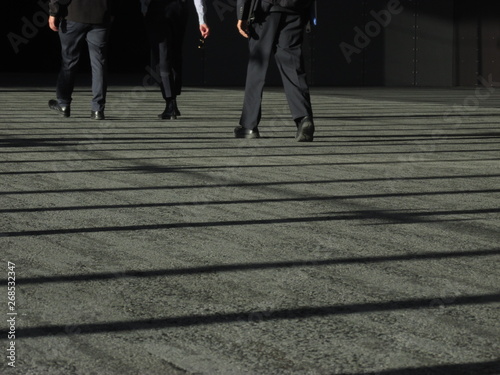 People walking inside a building © Michiru Maeda