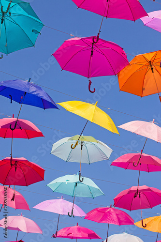 colorful, flying umbrellas