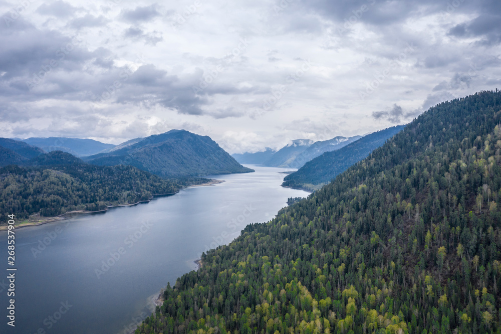 Mountain lake, low clouds, mountains, light fog Mountain lake, low clouds, mountains, light fog