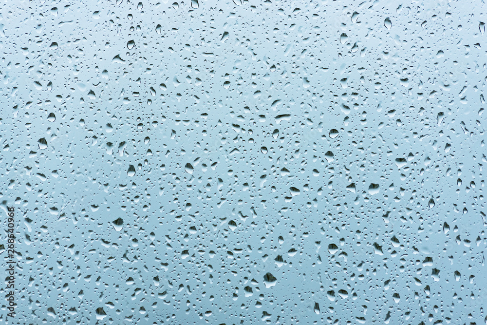 Background of water with water drops on glass Background of water with water drops on glass