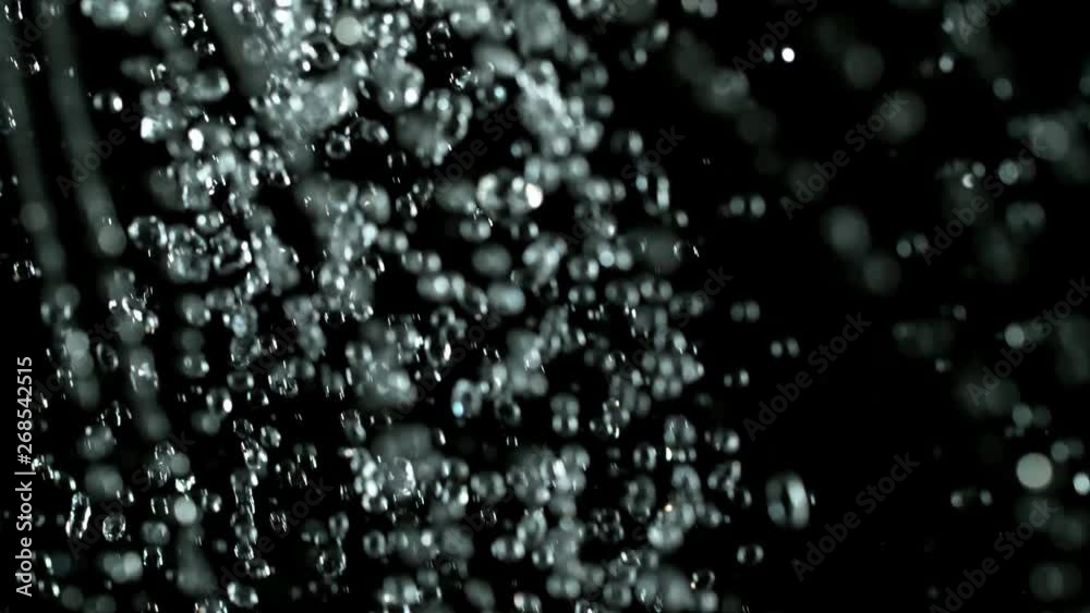 Super slow motion of splashing water drops. Filmed on very high speed camera, 1000 fps. Super slow motion of splashing water drops. Filmed on very high speed camera, 1000 fps.