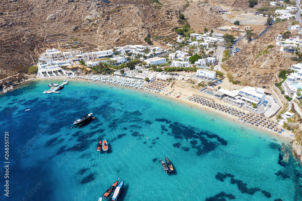 Aerial view to the famous celebrity beach Psarou on the Greek island of Mykonos, Cyclades