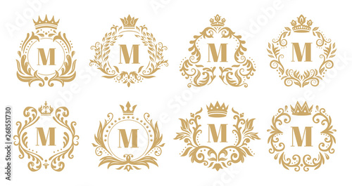Luxury monogram. Vintage crown logo, golden ornamental monograms and heraldic wreath ornament vector set photo