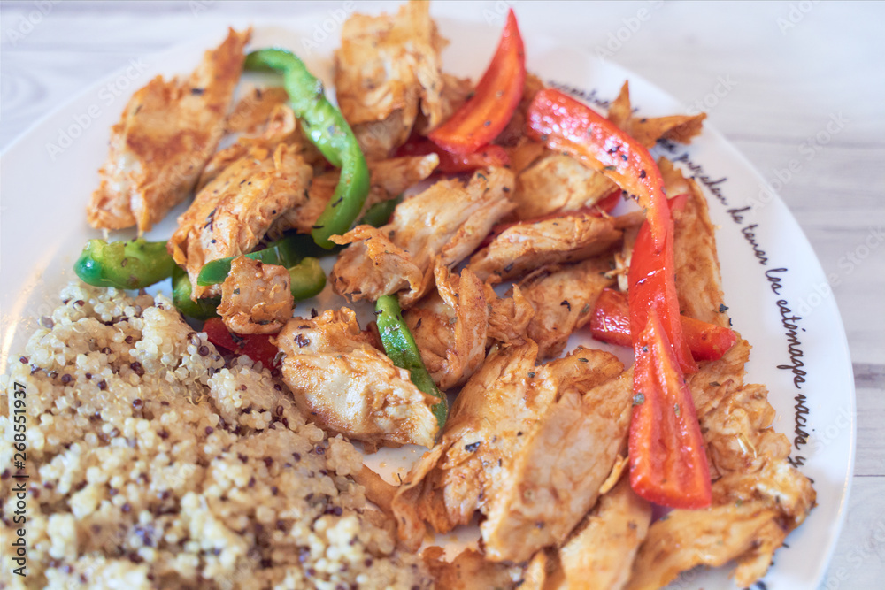 Seitan vegan chicken fillet with quinoa and organic peppers