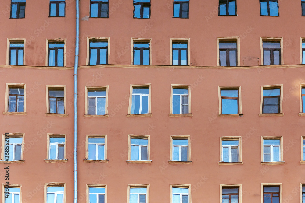 Fototapeta premium Distorted reflection of the building in the water