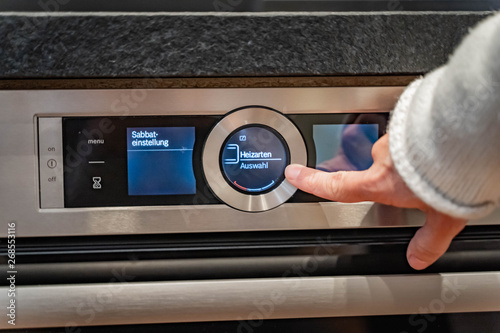 Electric stove showing settings for Shabbat mode, the text means 