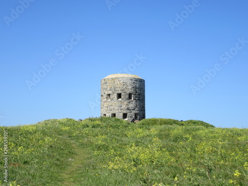 Martello tower on Guernsey coast photo