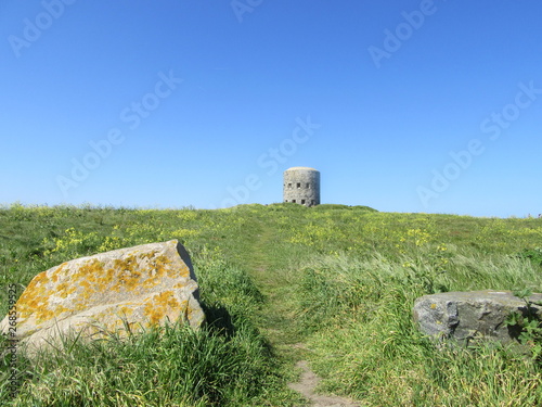 Martello tower on Guernsey coast photo