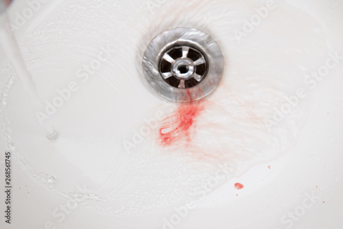 blood in basin,blood and washbasin in bath room,concept blood and basin in bath room,