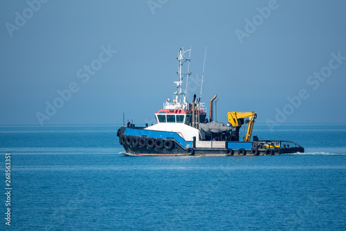The sea tug comes out of the harbor