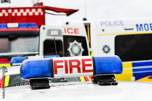 Blue lights on top of a fire vehicle in an emergency situation event