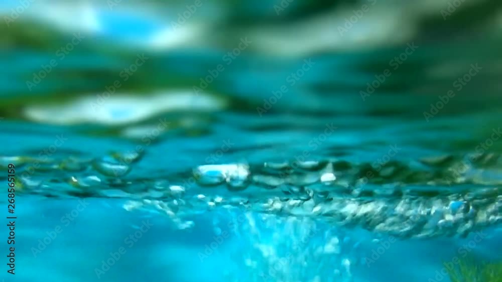 Bubbles in the stream underwater slow. Oxygen the air into the water. Bubbles in the stream underwater slow. Oxygen the air into the water.