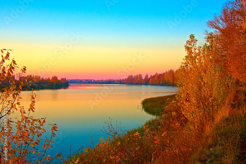 Fantastic beauty sunset on the Kostroma River in the fall. Kostroma, Russia.