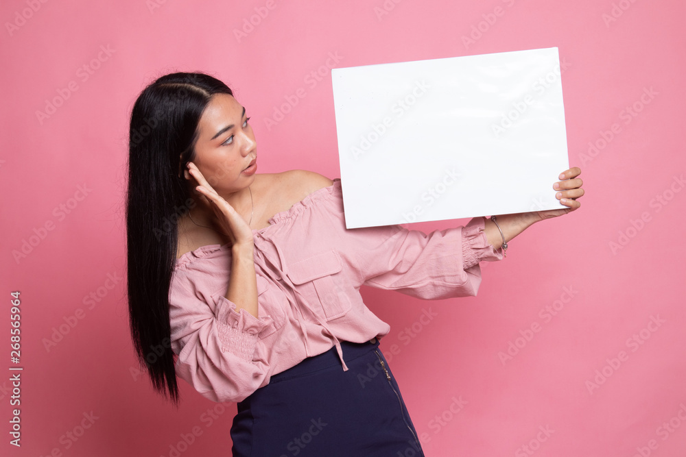 Young Asian woman  surprise with  white blank sign.