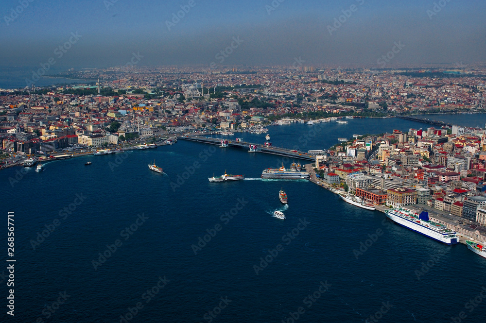 Aerial Urban View Photo of Istanbul Skyline and Cityscape with Goldenhorn, Karakoy, Eminonu distrcits and Galata Bridge, Turkey 