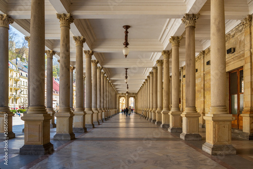 Diminishing perspective interior view of hallway along with stone columns with Renaissance style decoration at Mill Colonnade  in Karlovy Vary  Czech Republic.