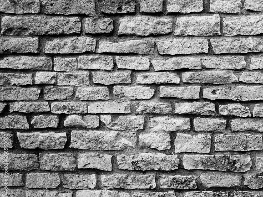 Obraz premium Black grey brick old stone wall texture background