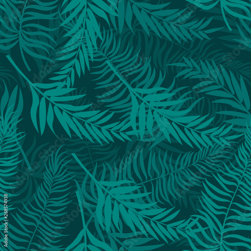 Seamless pattern made with green silhouettes of tropical leaves on dark green backgrounds Tropic folage texture.Vector flat illustration