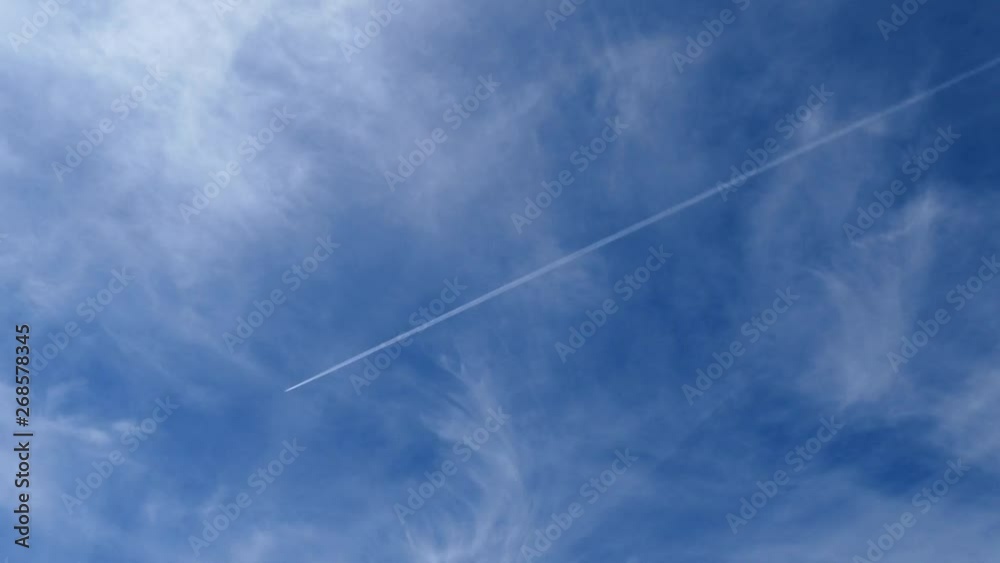 the blue sky and the flight of the aircraft carrying passengers, the blue sky and the flight of the aircraft carrying passengers,