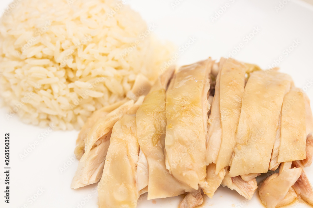 Hainanese chicken rice on plate Hainanese chicken rice on plate