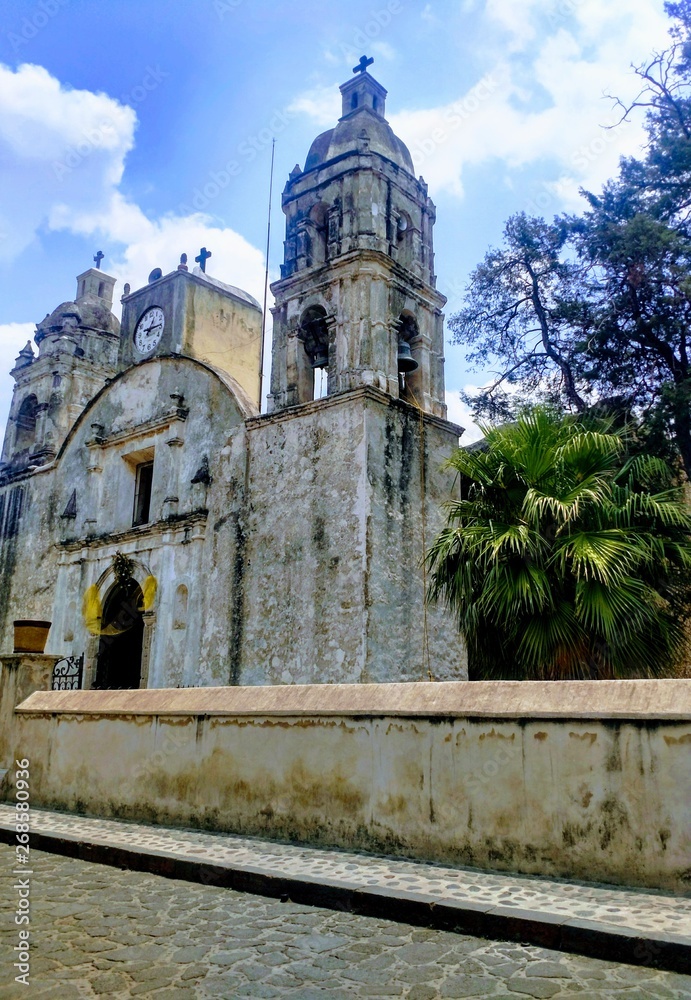 Old church in Tepoztlan for a weekend in Mexico with a nice perspective with wabisabi texture on the walls
