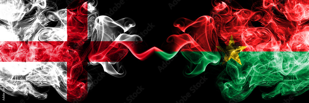 Obraz premium English vs Burkina Faso smoky mystic flags placed side by side. Thick colored silky smokes flag of England and Burkina Faso.
