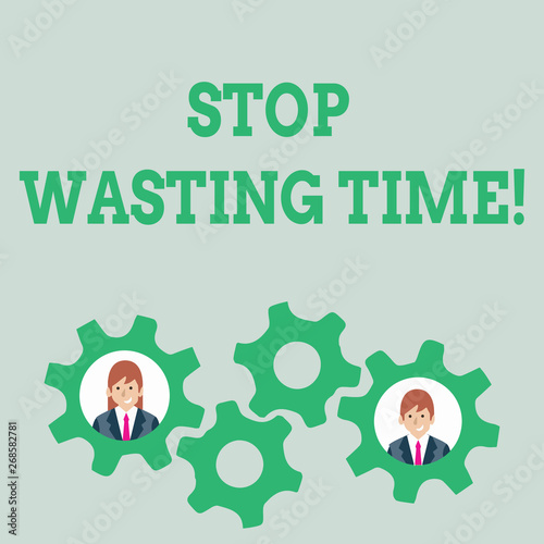 Text sign showing Stop Wasting Time. Business photo text advising demonstrating or group start planning and use it wisely Two Business People Each Inside Colorful Cog Wheel Gears for Teamwork Event