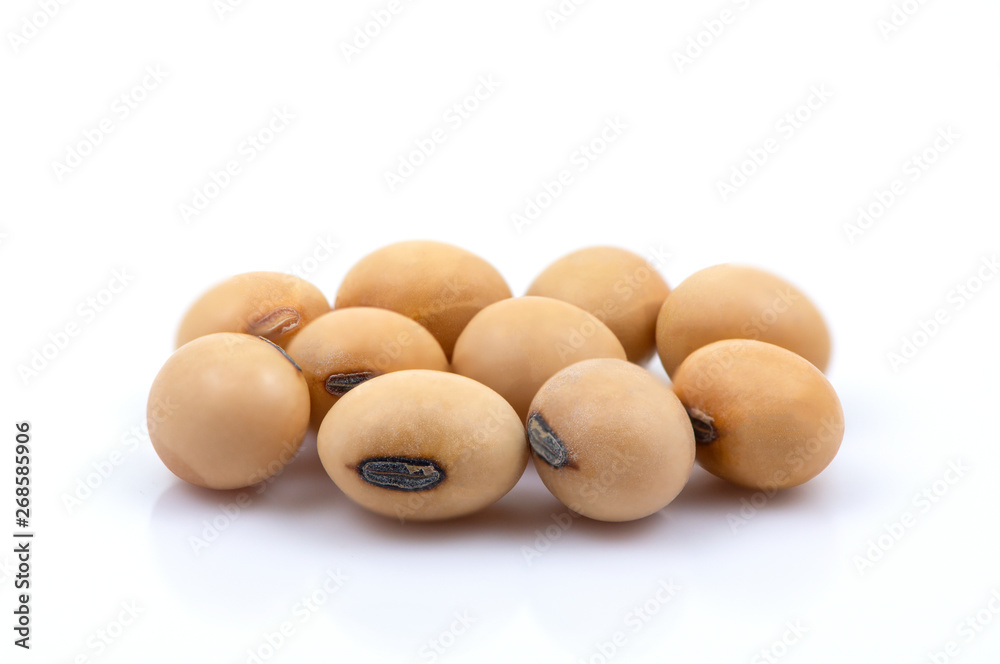 Pile of soy beans seeds isolated on white background. Selective focus. Pile of soy beans seeds isolated on white background. Selective focus.