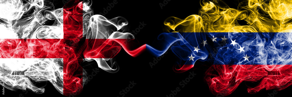 English vs Venezuela, Venezuelan smoky mystic flags placed side by side. Thick colored silky smokes flag of England and Venezuela, Venezuelan.