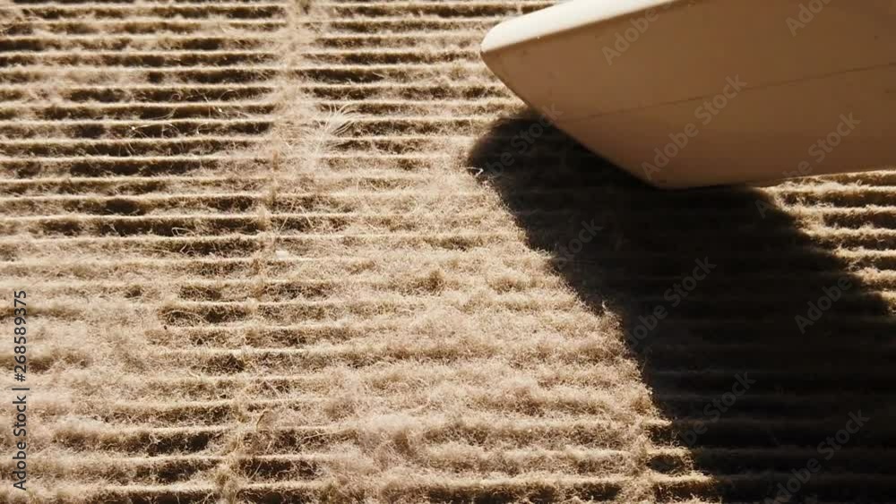 slow motion of vacuum cleaner cleaning a dirty air filter