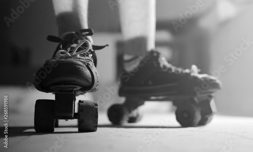 Wheels of roller skates closeup in the rays of light