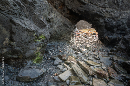 low tide exposes a sea cave