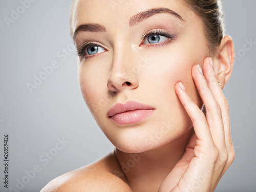 Young woman with beautiful face. Skin care