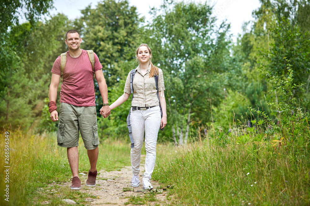 two travelers in the forest