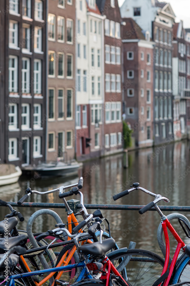 The beautiful city of Amsterdam. Bikes on the bridge