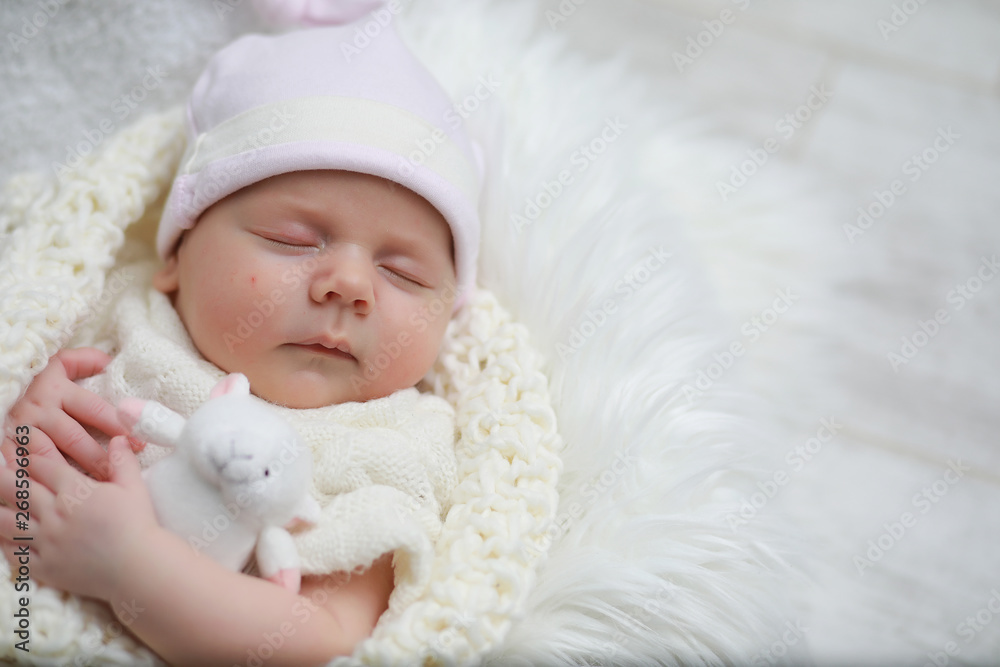 Baby newborn sleeping wrapped up in a blanket Baby newborn sleeping wrapped up in a blanket