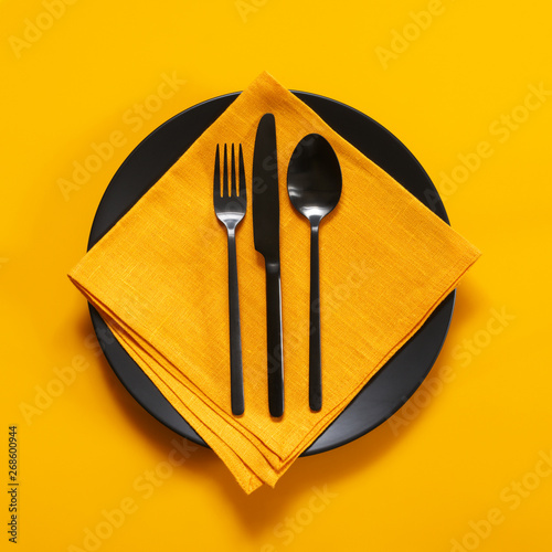 Yellow and black table setting