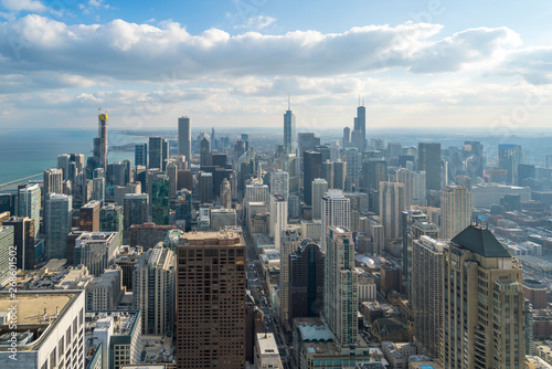 Beautiful scenic view of business district of Chicago loop with blue skyline in sunny day. Panoramic view aerial top view or drone architecture view of city. Famous attraction in Chicago  USA.