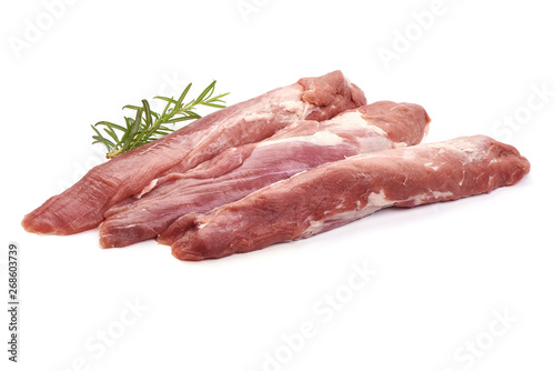Fresh tenderloin with rosemary, raw meat, close-up, isolated on white background