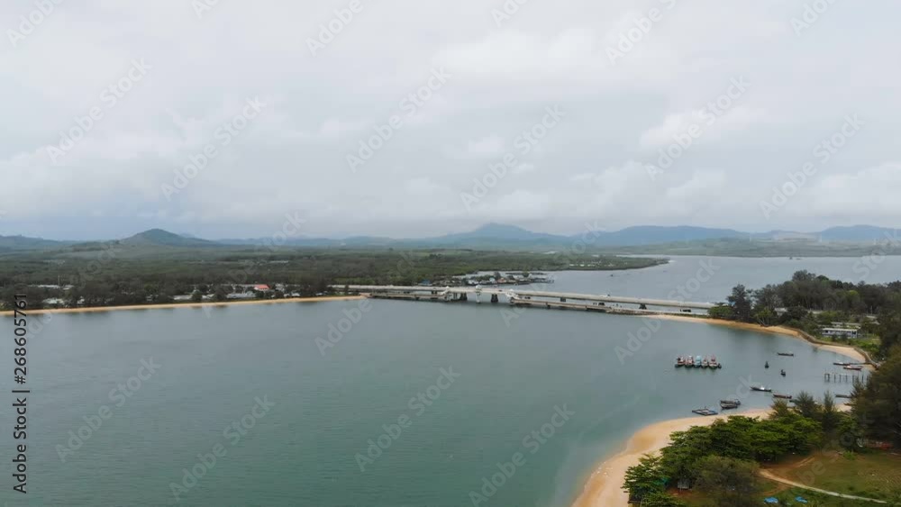 Drone shot aerial view of the bridge motorway express way toll nearly natural big river and mountain Drone shot aerial view of the bridge motorway express way toll nearly natural big river and mountain