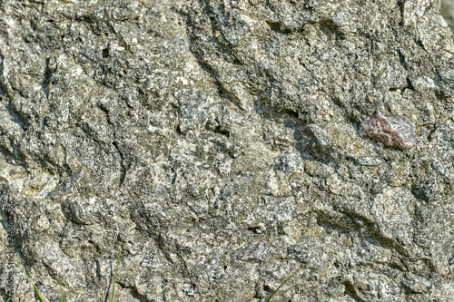 the textured stone surface or gray background