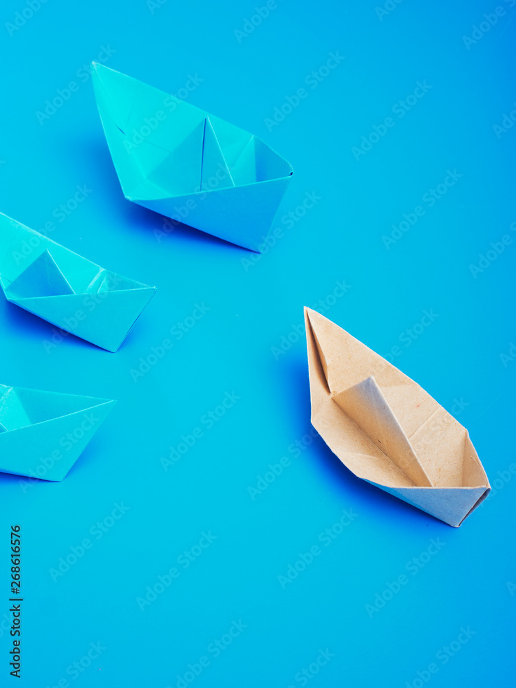Leadership concept origami boat paper Leadership concept origami boat paper