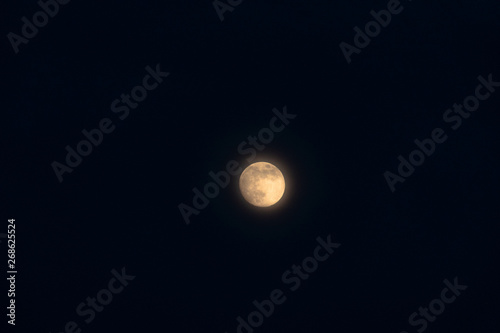 Full moon isolated on a black sky